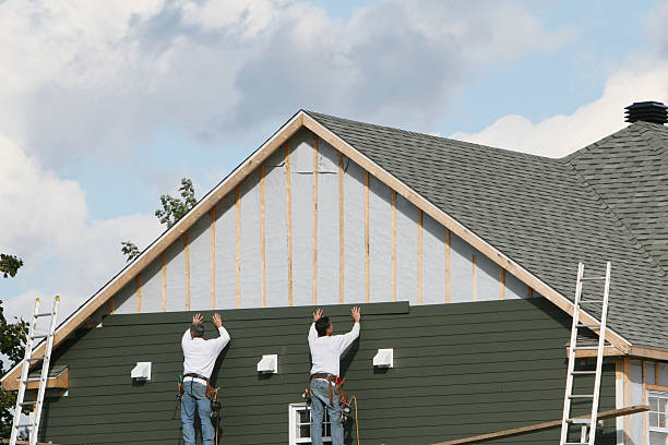 Professional Emergency Siding Repair technician working in Newtown, VA